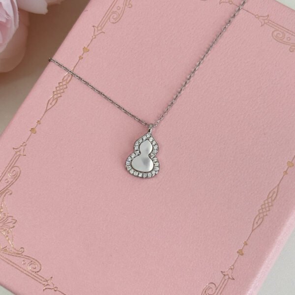 S925 sterling silver mother-of-pearl and zircon small gourd earrings