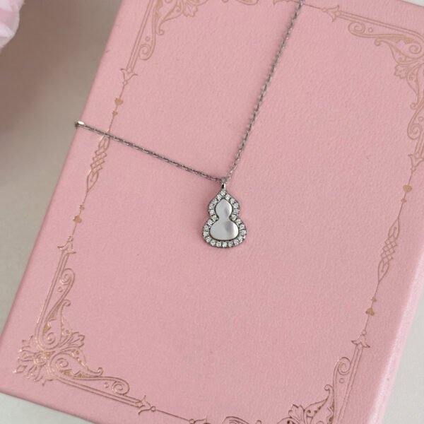 S925 sterling silver mother-of-pearl and zircon small gourd earrings