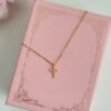 S925 sterling silver plated with 14K gold mini cross necklace